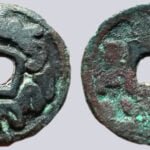 Central Asia, AE cash, w. crosses and tamgas. 7th - 8th cent. AD