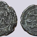 Umayyad, AE silver washed fals, al-Mubaraka, 117AH